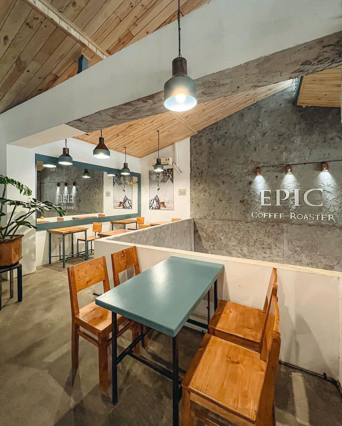 Wooden tables along the café windows
