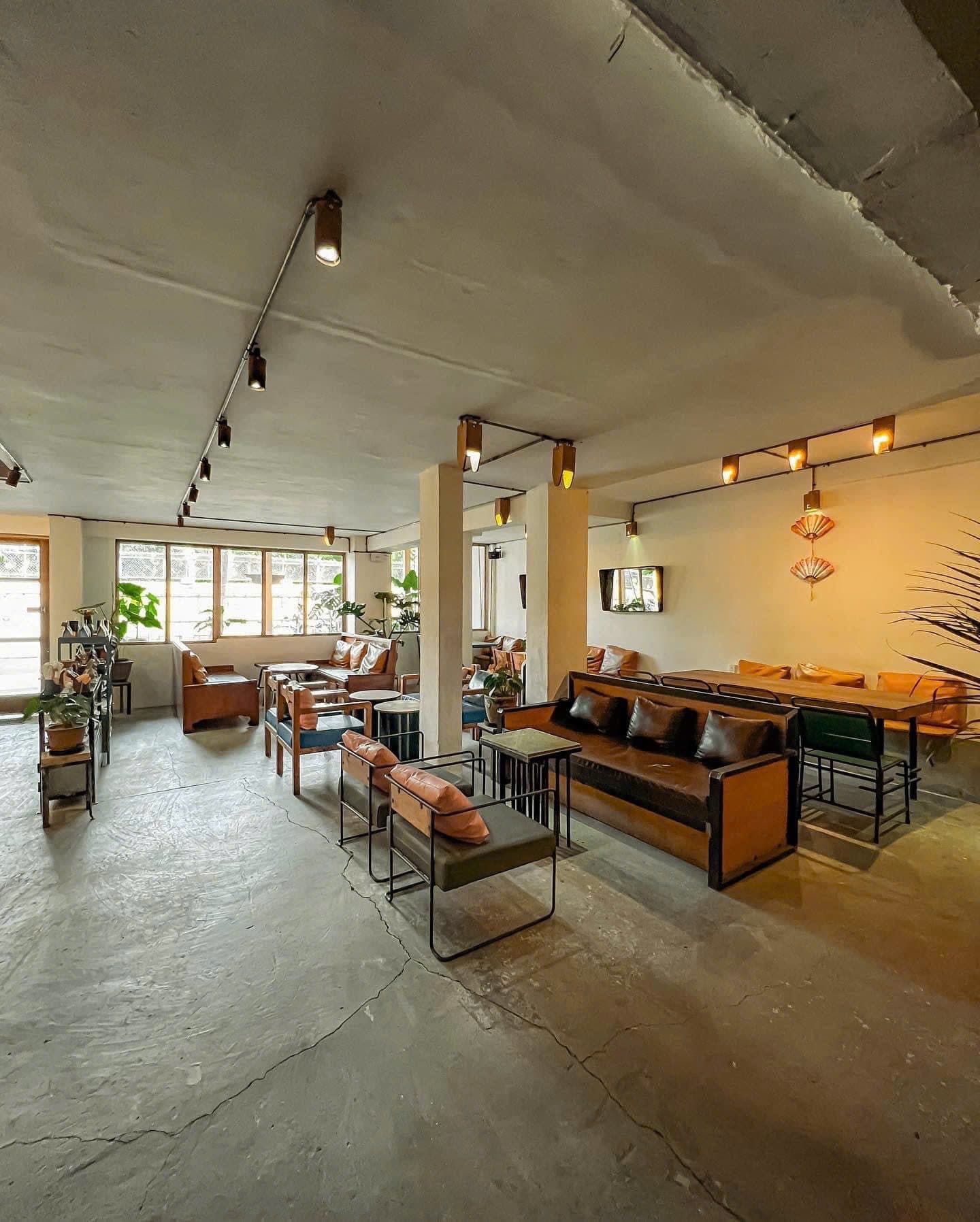 Sunlight across the café's wooden tables